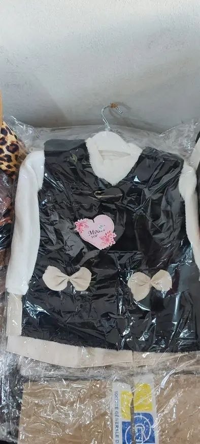 ملابس اولاد عيد image