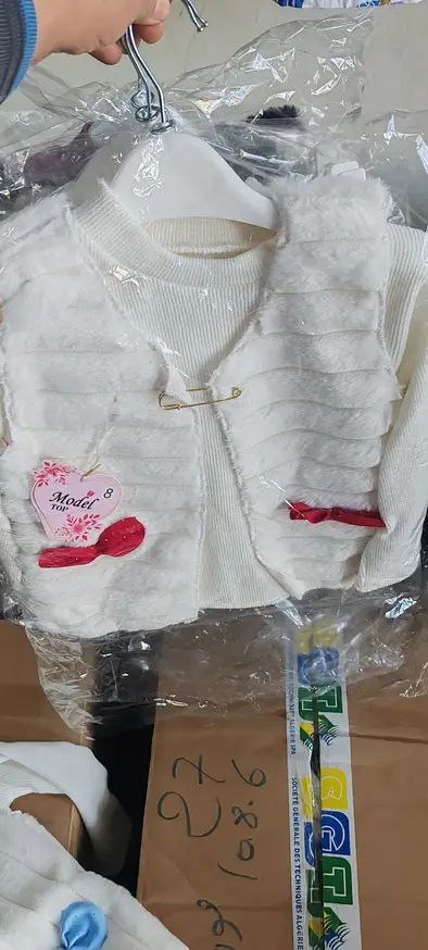 ملابس اولاد عيد image